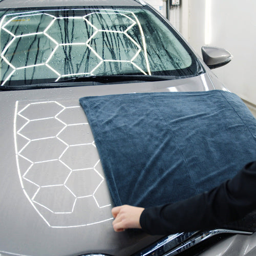 Produktbild av IVON Torkduk Premium 1200 gsm 70x90 cm – exklusiv torkduk med hög fiberhöjd och mörkgrå färg.